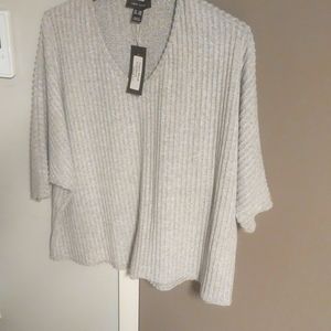 Knit top made by New Look for women.